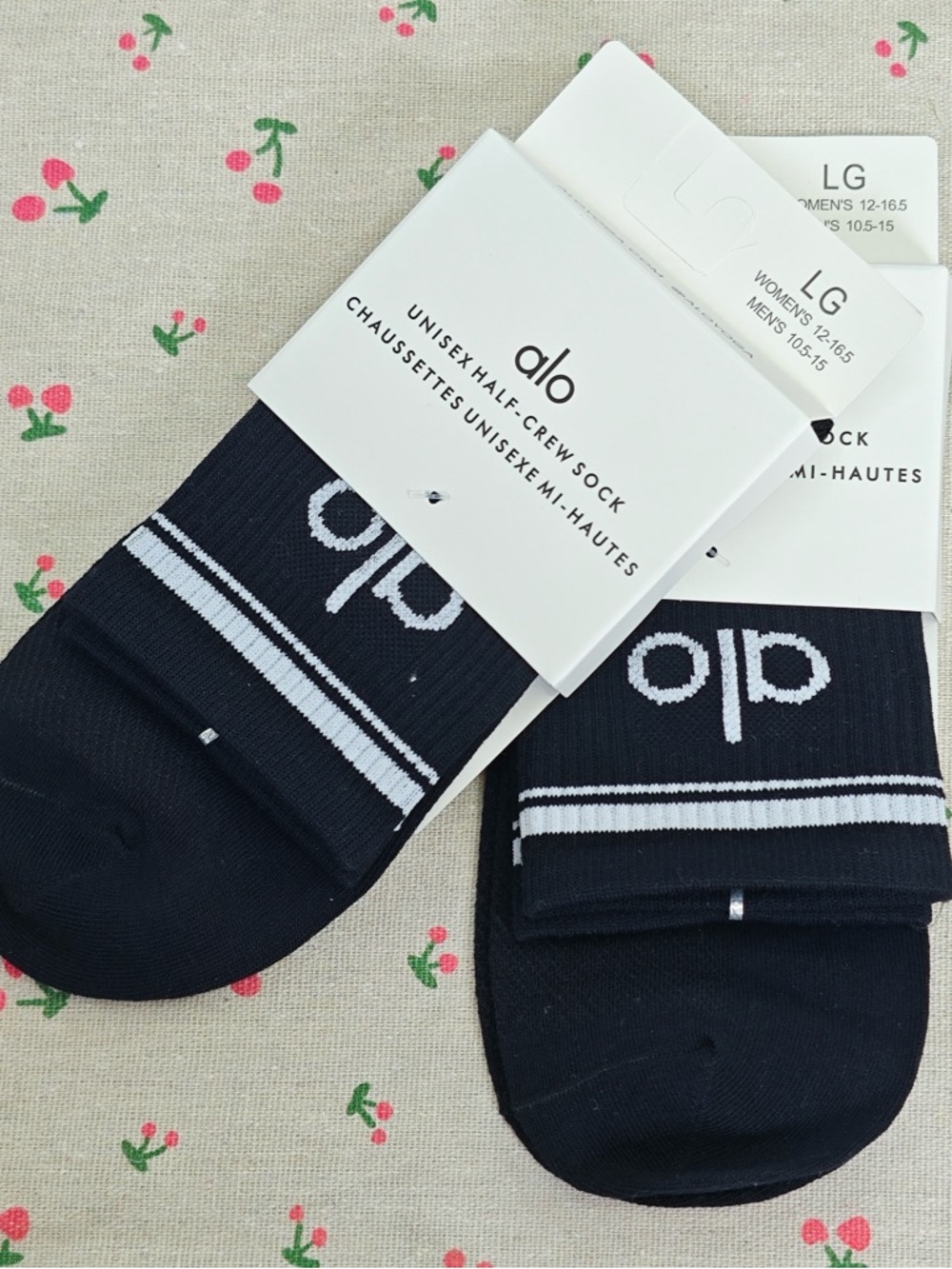 ALO Yoga Black Half-Crew Socks with White Stripes and Logo